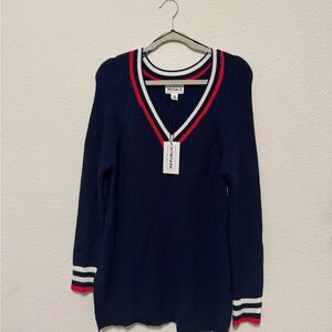 For the Republic Blue V-Neck Sweater with Red & White Accents